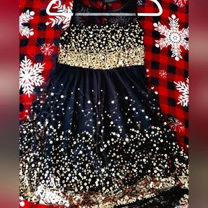Stunning black and gold girls dress size 14 with satin sash